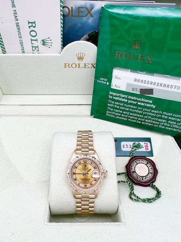 Rolex 69258 Ladies President Diamond Dial Bezel 18K Yellow Gold Box Paper: Condition: Pre-owned - Excellent,Bezel Type: Diamond,Movement: Mechanical (Automatic),Seller Warranty: Yes,Year Manufactured: 1990-1999,With Papers: Yes,Reference Number: 69258,Brand: Rolex,Type: