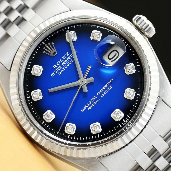 MENS ROLEX DATEJUST BLUE VIGNETTE DIAMOND 18K WHITE GOLD STAINLESS STEEL WATCH: Condition: Pre-owned - Excellent,Bezel Color: Silver,Max Wrist Size: 7.26-7.5 in,Number of Jewels: 26 Jewels,Indices: Diamond Hour Marks, 12-Hour Dial, Multiple Hands,Bezel: Rolex 18K White Gold Flute
