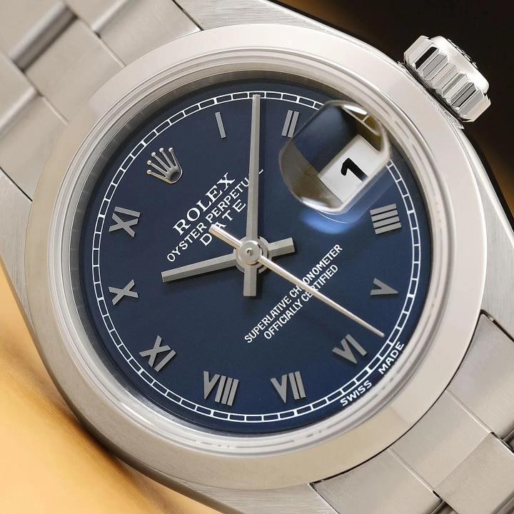 ROLEX LADIES OYSTER PERPETUAL DATE 69160 BLUE ROMAN DIAL STAINLESS STEEL WATCH: Condition: Pre-owned - Excellent,Gender: Women's,Brand: Rolex,Style: Dress/Formal, Luxury, Luxury: Dress Styles,Dial: Rolex Roman Dial,Bezel: Rolex Stainless Steel Smooth Bezel,Features: 12-Hour
