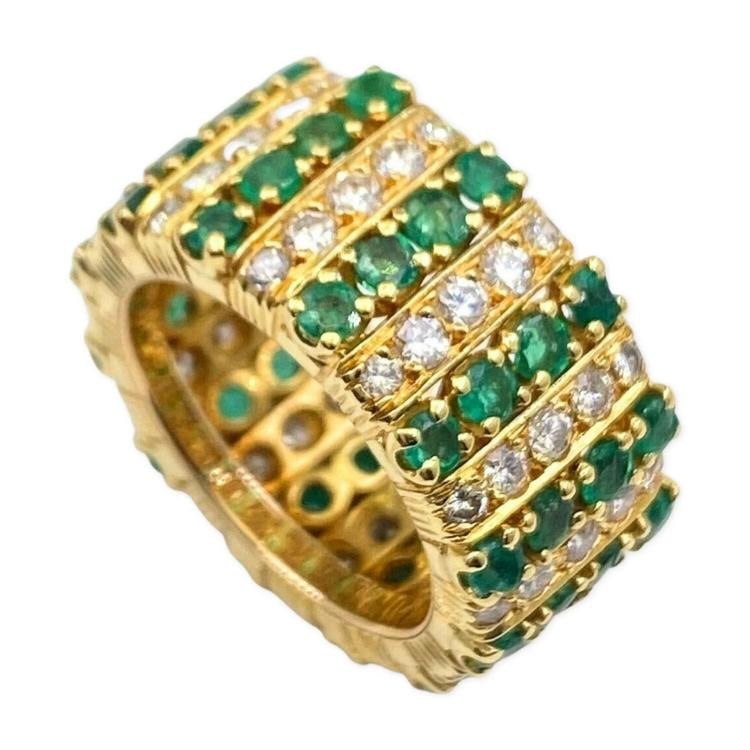 Emerald and Diamond Eternity Cocktail Ring 18K Yellow Gold: Condition: Pre-owned - Excellent,Main Stone Creation: Natural,Fancy Diamond Color: Not Applicable,Color: Green,Sizable: No,Ring Shape: Wide,Main Stone Color: Green,Material: Gemstone,Metal: Yellow