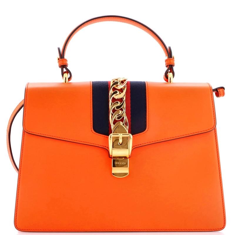 Gucci Sylvie Top Handle Bag Leather Medium: Accessories: With Strap Measurements: Handle Drop 4.5", Height 8.5", Width 12.5", Depth 4.5", Strap Drop 16-18". Condition: Pre-owned - Excellent,Brand: Gucci,Exterior Material: Leather,Style: Top Han