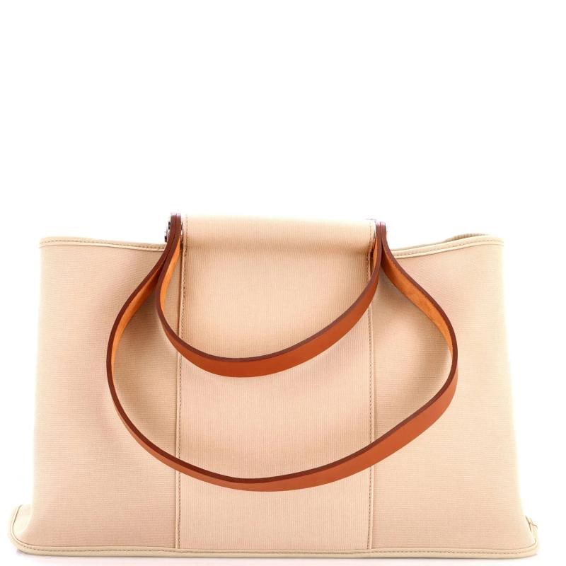 Hermes Cabag Elan Toile and Leather 39: Measurements: Handle Drop 4.5", Height 10", Width 15", Depth 6", Strap Drop 10". Condition: Pre-owned - Good,Brand: Hermes,Exterior Material: Leather, Canvas Plain,Style: Totes,Exterior Color: