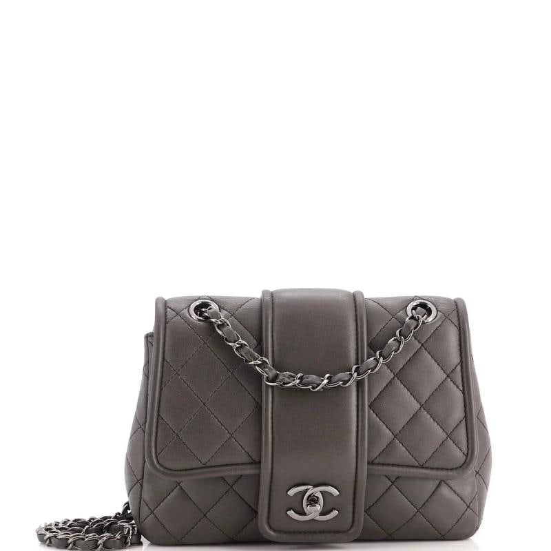 Chanel Elementary Chic Flap Bag Quilted Lambskin Medium: Accessories: Dust Bag, Authenticity Card Measurements: Handle Drop 10", Height 7.5", Width 9", Depth 3", Strap Drop 19". Condition: Pre-owned - Excellent,Brand: Chanel,Exterior Material: