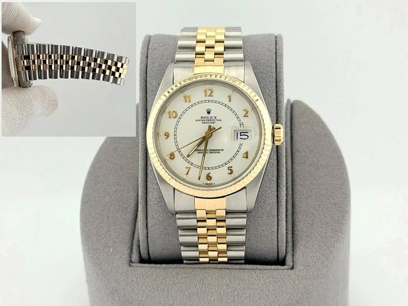 Rolex Datejust 16013 36mm White Boiler Gauge Dial 18k Gold Steel Jubilee: Style Number: 16013 Serial: 752**** Year: 1983 Model: Rolex Datejust Case Material: Stainless Steel Band: 18k Yellow Gold & Stainless Steel Jubilee Bezel: 18k Yellow Gold Fluted Dial: Factory White Bo
