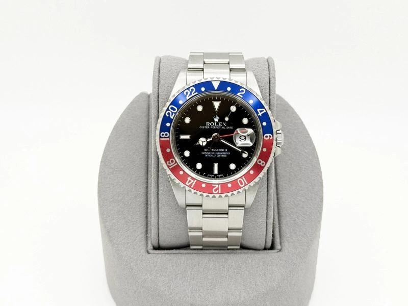 2001 Unpolished Rolex GMT Master II Pepsi 16710 40mm Red Blue Bezel Steel: Style Number: 16710 Serial: K31**** Year: 2001 Model: Rolex GMT Master II Pepsi (Unpolished) Case Material: Stainless Steel Band: Stainless Steel Bezel: Pepsi - Red & Blue Dial: Black Crystal: