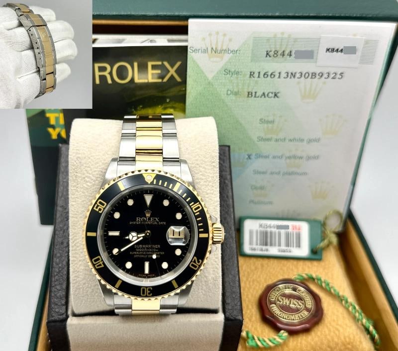 2003 Rolex Submariner 16613 Black 40mm 18k Yellow Gold Stainless Steel Box Paper: Style Number: 16613 Serial: K844*** Year: 2003 Model: Rolex Submariner Two Tone Case Material: Stainless Steel Band: 18K Yellow Gold & Stainless Steel Bezel: Black Dial: Black Crystal: Sapphire Case S