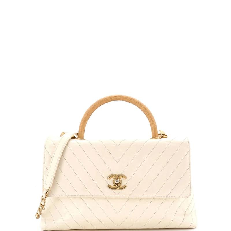 Chanel Coco Top Handle Bag Chevron Calfskin with Lizard Embossed Leather Medium: Accessories: Dust Bag, With Strap Measurements: Height 8", Width 12.5", Depth 4.5". Condition: Pre-owned - Good,Brand: Chanel,Exterior Material: Leather, Exotic, Lizard,Style: Top Handle,Exterior Colo