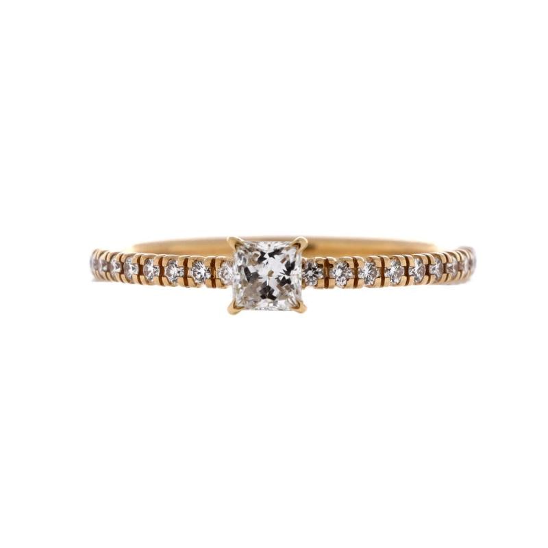 Cartier Etincelle de Cartier Ring 18K Yellow Gold with Princess Cut Diamond: Measurements: Size: 5.25 - 50, Width: 1.50 mm . Condition: Pre-owned - Good,Brand: Cartier,Main Stone: Diamond,Metal: 18K Yellow Gold,Metal Purity: 18K,Ring Size: 5.25 - 50,Type: Ring,Color: Yellow