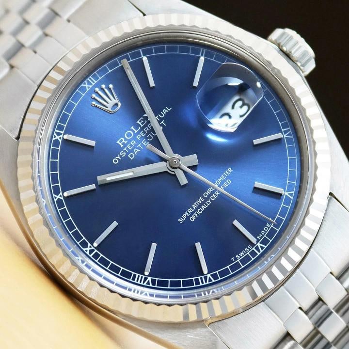 ROLEX MENS DATEJUST 16014 BLUE DIAL 18K WHITE GOLD STAINLESS STEEL WATCH: Condition: Pre-owned - Excellent,Bezel Color: Silver,Max Wrist Size: 7.26-7.5 in,Number of Jewels: 27 Jewels,Indices: Stick Indexes, 12-Hour Dial,Bezel: Rolex 18K White Gold Fluted Bezel,Band/Strap: B