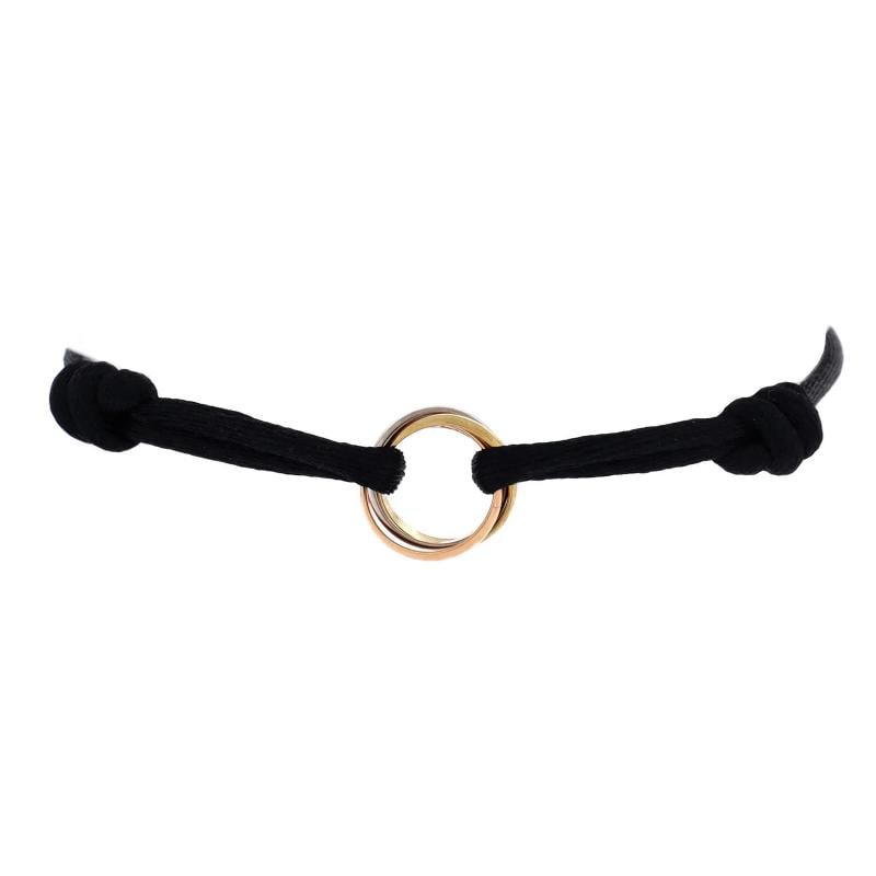Cartier Trinity On Cord Bracelet Silk Cord with 18K Tricolor Gold: Condition: Pre-owned - Good,Brand: Cartier,Main Stone: Unknown,Metal: 18K Tri Colored Gold,Metal Purity: 18K,Style: Bracelet,Type: Bracelet,Color: Tricolor Gold,Material: 18K Rose Gold, 18K White Gold