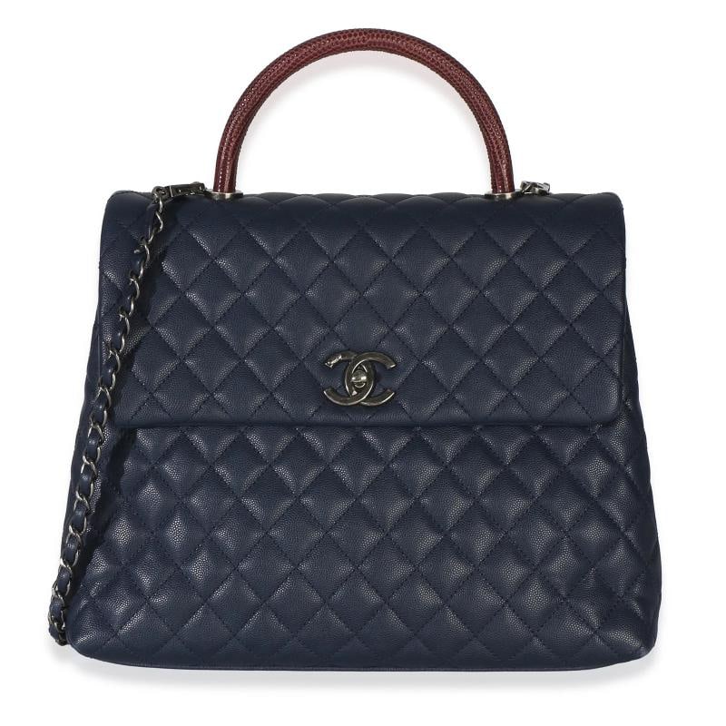 Chanel Navy Quilted Caviar Lizard Large Coco Top Handle Bag: Condition: Pre-owned - Good,Dimensions: 123.25 x 9.75 x 4.25,Handbag Accessories: Dustbag;Removable Strap,Bag Width: 123.25 in,Bag Depth: 4.25 in,Bag Height: 9.75 in,Department: Unisex,Style: Shoulder