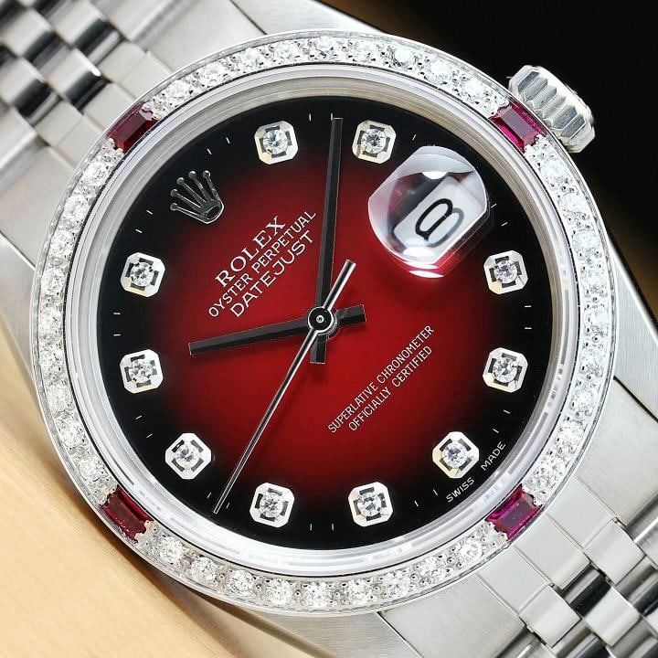MENS ROLEX DATEJUST 16014 RED VIGNETTE DIAMOND RUBY 18K WHITE GOLD STEEL WATCH: This is an authentic Rolex Datejust 16014 watch with Rolex stainless steel jubilee bracelet, Rolex dial Ref. with added custom diamond markers, and custom 18K white gold diamond and ruby bezel. Descri