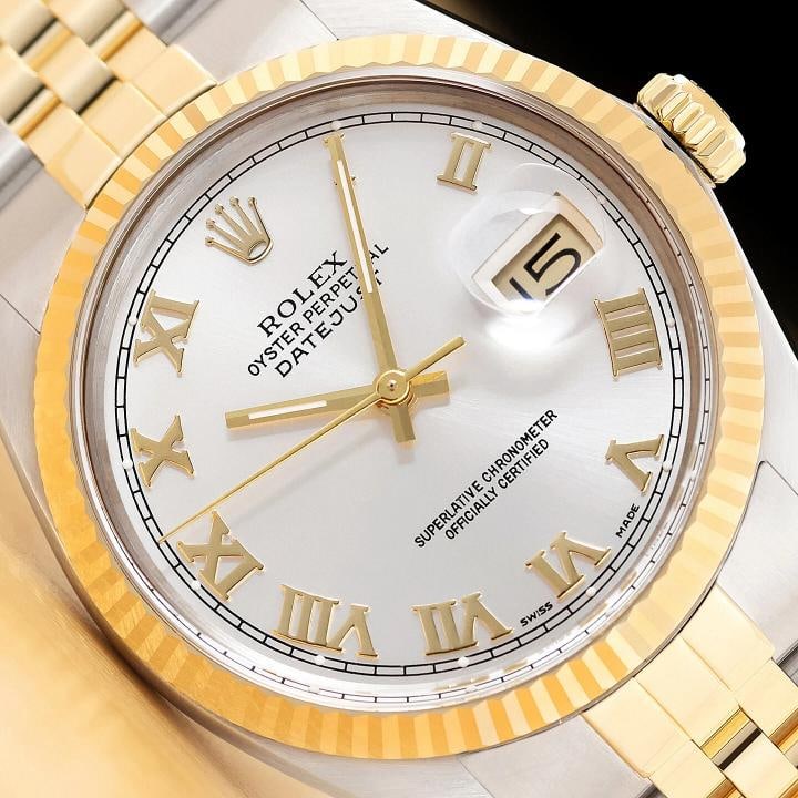 ROLEX MENS DATEJUST 16013 18K GOLD STEEL SILVER ROMAN DIAL WATCH w/ ROLEX BAND: Condition: Pre-owned - Excellent,Bezel Color: Gold,Max Wrist Size: 7.26-7.5 in,Number of Jewels: 27 Jewels,Indices: Roman Numerals, 12-Hour Dial, Multiple Hands,Bezel: Rolex 18K Yellow Gold Fluted Bez