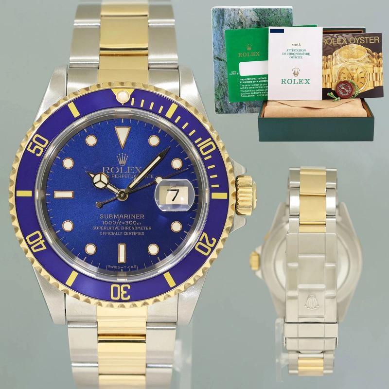 1996 MINT PAPERS Rolex Submariner 16613LB Two Tone Yellow Gold Sunburst Blue: Case & Dial Case Material: Rolex Two-Tone Yellow Gold & Stainless Steel Case Size: 40mm Bezel: Rolex Blue Crystal: Rolex Sapphire Dial: Rolex Blue Movement & Bracelet Movement: Rolex Automatic