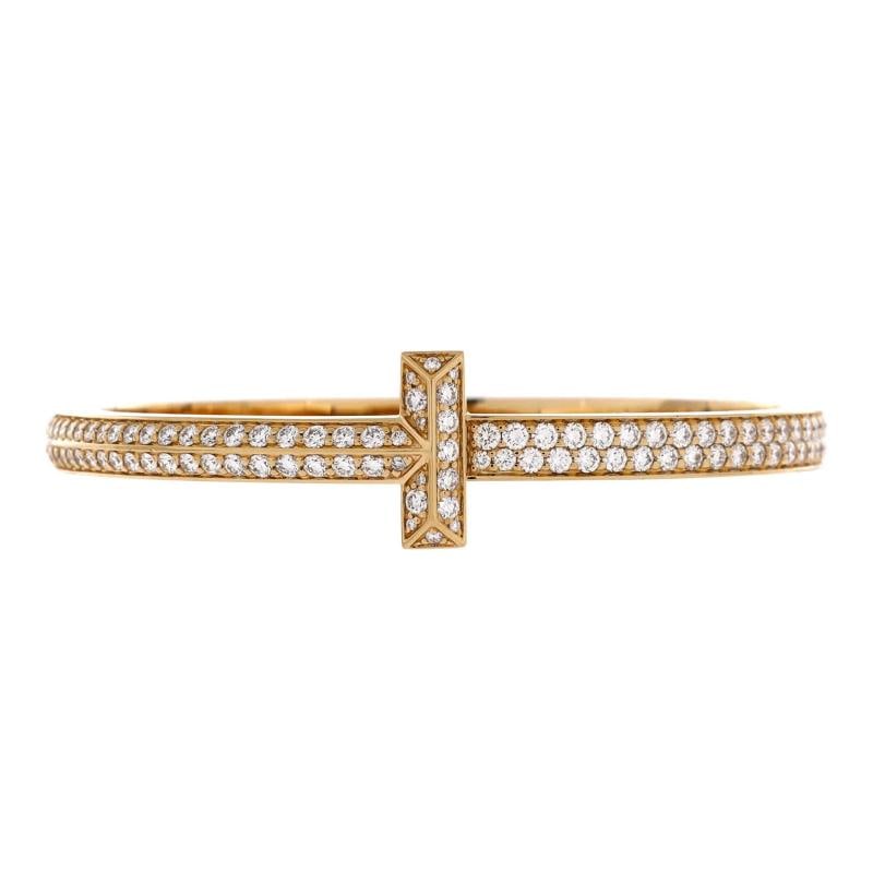 Tiffany & Co. T1 Hinged Bangle Bracelet 18K Yellow Gold with Pave Diamonds Wide: Condition: Pre-owned - Good,Brand: Tiffany & Co.,Main Stone: Diamond,Metal: 18K Yellow Gold,Metal Purity: 18K,Style: Bangle,Type: Bracelet,Color: Yellow Gold,Material: 18K Yellow Gold, Diamond