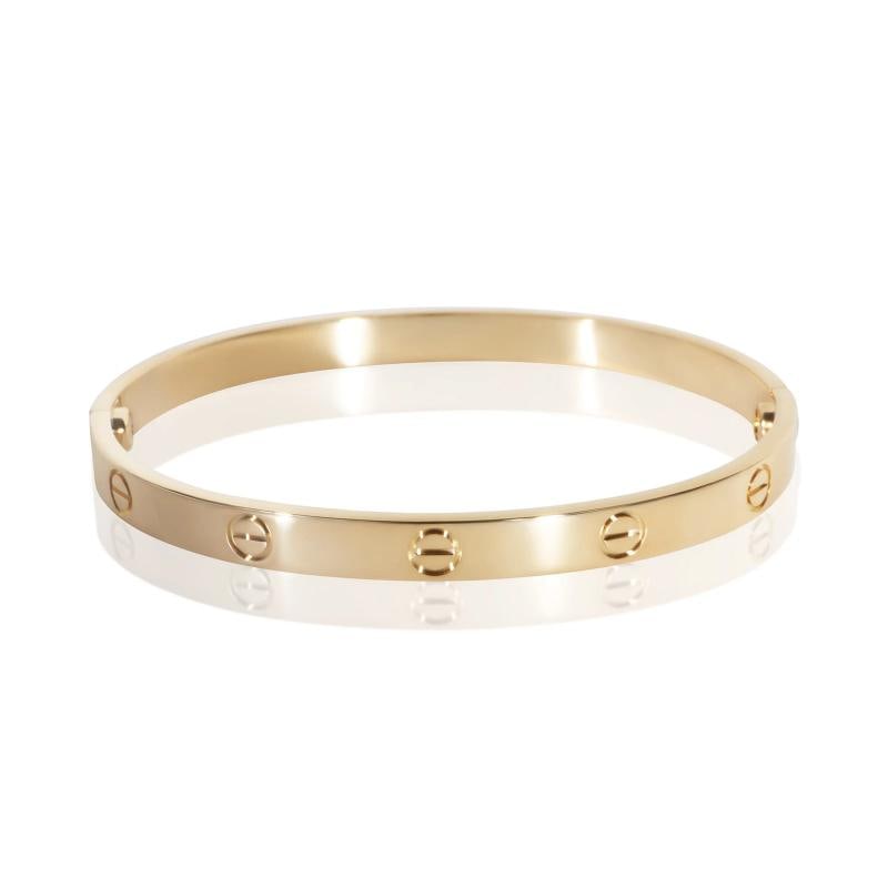 Cartier Yellow Gold Love Bracelet: Condition: Pre-owned,Item Length: 19 cm,Clasp/Buckle Type: Screw,With Original Box/Packaging: Yes,With Papers: Yes,Side Stone Type: No Stone,Metal Purity: 18k,Gross Weight (grams): 34.91,Department: M