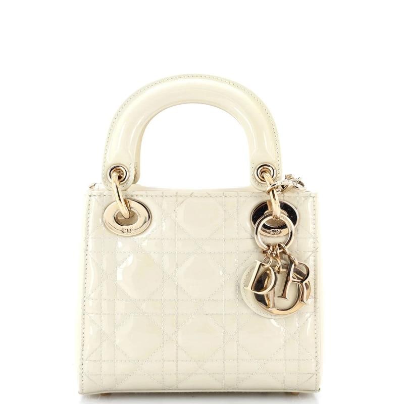 Christian Dior Lady Dior Chain Bag Cannage Quilt Patent Mini: Condition: Pre-owned - Fair,Brand: Christian Dior,Exterior Material: Patent Leather,Style: Top Handle,Exterior Color: White,Department: Women,Size: Mini,Accessories: Dust Bag, With Strap