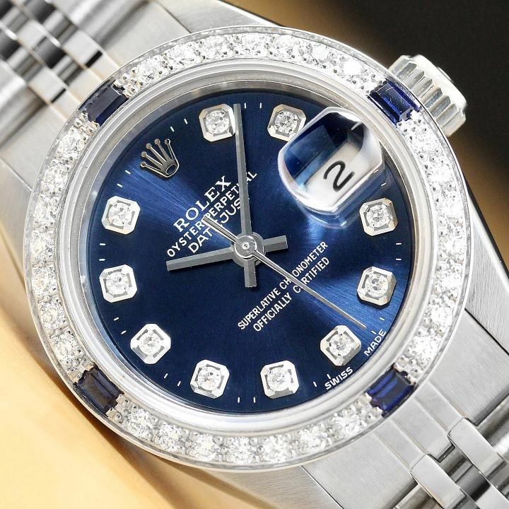 LADIES ROLEX DATEJUST 69174 18K GOLD SAPPHIRE DIAMOND STEEL BLUE QUICKSET WATCH: Condition: Pre-owned - Excellent,Bezel Color: Silver,Max Wrist Size: 6.26-6.75 in,Number of Jewels: 29 Jewels,Indices: Diamond Markers, 12-Hour Dial, Seconds Hand,Band: Custom Stainless Steel Jubilee