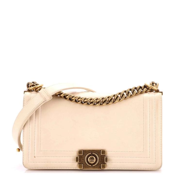Chanel Reverso Boy Flap Bag Glazed Calfskin Old Medium: Accessories: Dust Bag, Authenticity Card Measurements: Handle Drop 12", Height 6", Width 10", Depth 3", Strap Drop 20". Condition: Pre-owned - Fair,Brand: Chanel,Exterior Material: Leather,Style:
