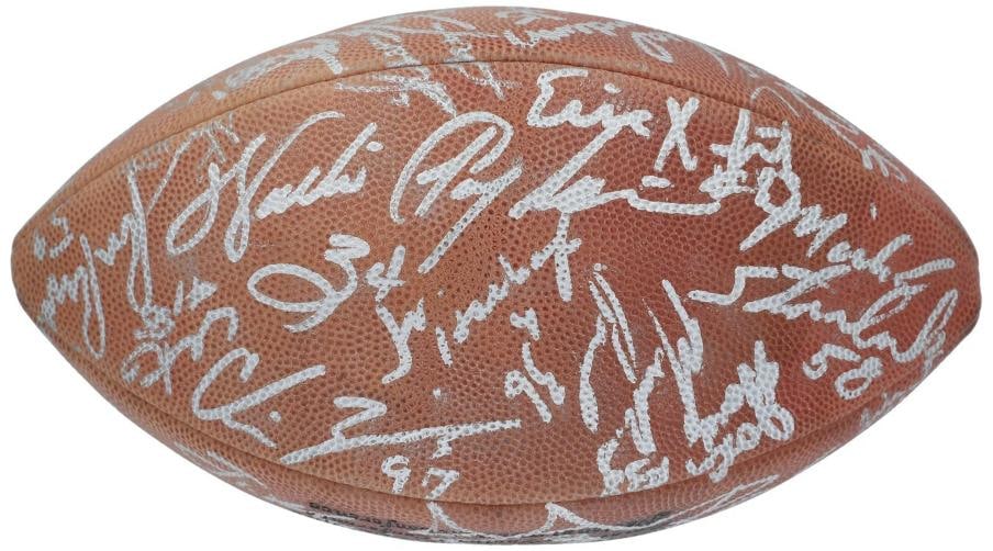1991 Chicago Bears Team Signed Football 25+Sigs With Walter Payton JSA COA: 25 former members of the Chicago Bears. Each signature has been penned in silver marker. Notable signatures include Hall of Famer Walter Payton, as well as Jim harbaugh, Thom Thayer, Trace Armstrong,