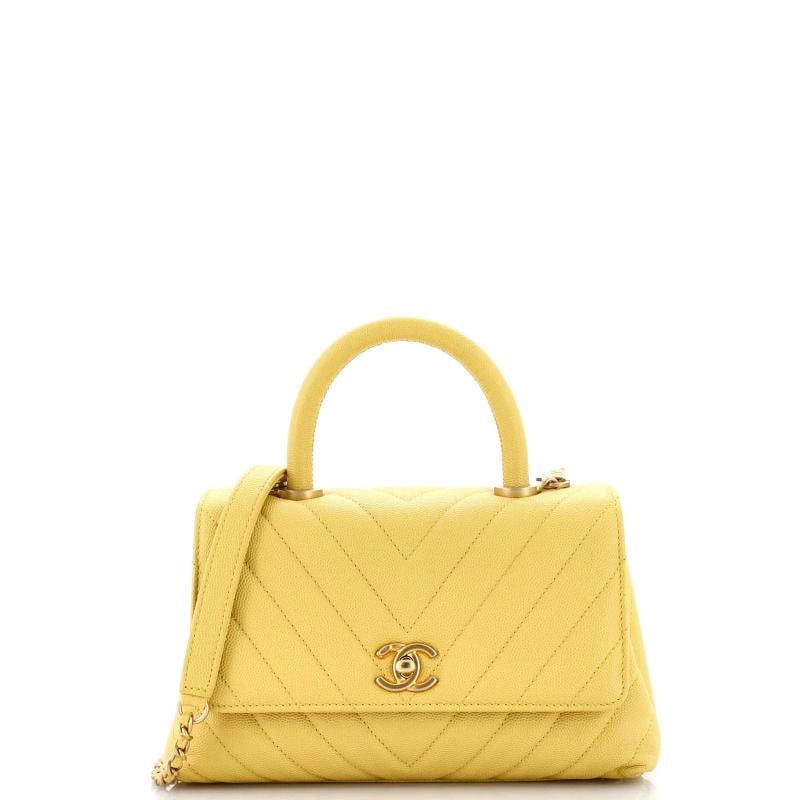 Chanel Coco Top Handle Bag Chevron Caviar Mini: Accessories: Authenticity Card, With Strap Measurements: Handle Drop 3.5", Height 6", Width 9", Depth 4", Strap Drop 18". Condition: Pre-owned - Good,Brand: Chanel,Exterior Material: Leather,Style: