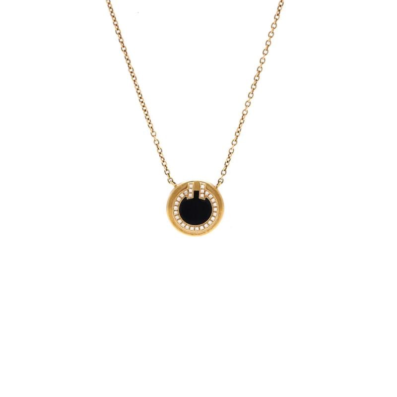 Tiffany & Co. T Circle Pendant Necklace 18K Yellow Gold with Onyx and Diamonds: Measurements: Length: 16.0 - 18.0 ", Width: 0.63 mm, Pendant Length: 10.85 mm, Pendant Width: 10.85 mm . Condition: Pre-owned - Good,Brand: Tiffany & Co.,Main Stone: Diamond,Metal: 18K Yellow