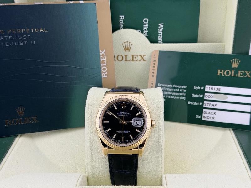 Rolex Datejust 116138 36mm Black Dial 18k Yellow Gold Box Paper: Style Number: 116138 Year: 2013 Model: Rolex Datejust Case Material: 18k Yellow Gold Band: Factory Rolex Black Leather Strap Bezel: 18k Yellow Gold Fluted Dial: Black Crystal: Sapphire Case Size: 36mm