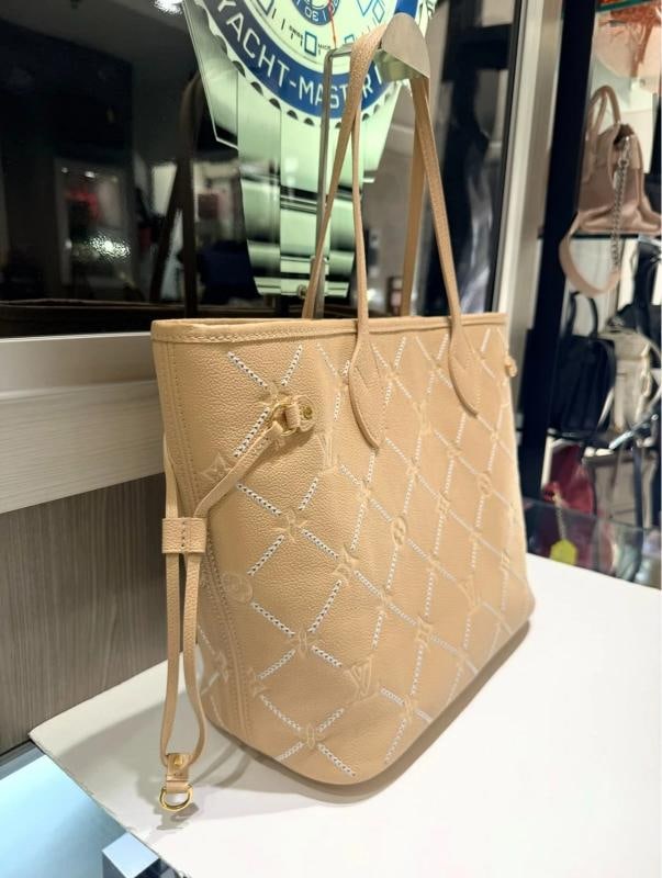 Louis Vuitton Neverfull MM Monogram Empreinte Couture in Hazelnut - 2