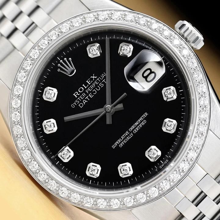ROLEX MENS DATEJUST BLACK DIAL 18K GOLD STEEL DIAMOND WATCH w/ FOLDED BRACELET: This is an authentic Rolex Datejust 1603 watch with custom 18K white gold diamond bezel, Rolex dial Ref. with added genuine diamond markers, and Rolex stainless steel folded jubilee bracelet.