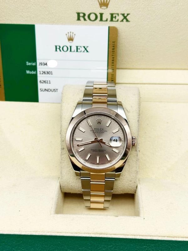 Rolex Datejust 41 126301 Sundust Dial 18K Rose Gold Steel Box Paper: Condition: Pre-owned - Excellent,Country of Origin: Switzerland,Bezel Color: Rose,Movement: Mechanical (Automatic),,Year Manufactured: 2010-2019,With Papers: Yes,Reference Number: 126301,Band/Strap: R