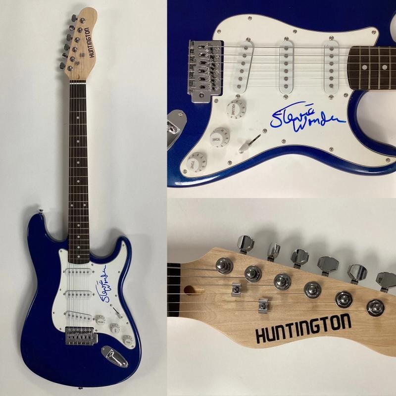 Stevie Wonder Signed Guitar (JSA LOA): Industry: Music,Artist: Stevie Wonder,Brand: Huntington,Signed: Yes,Size: 39",Autograph Authentication: James Spence (JSA),Object Type: Guitar & Guitar Pick,Model: Electric