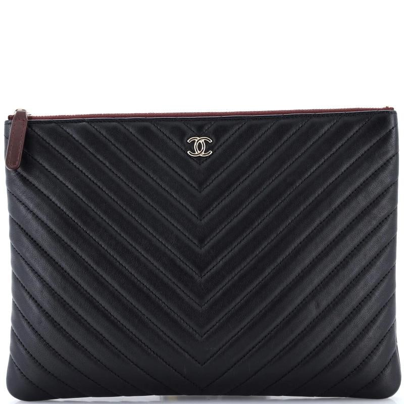 Chanel O Case Clutch Chevron Calfskin Large: Condition: Pre-owned - Excellent,Brand: Chanel,Exterior Material: Leather,Style: Clutches,Exterior Color: Black,Department: Women,Size: Large,Accessories: Authenticity Card, Dust Bag Condition: Excell