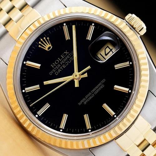 ROLEX MENS DATEJUST 16233 BLACK DIAL 18K YELLOW GOLD STAINLESS STEEL WATCH: This is an authentic Rolex Datejust 16233 watch with Rolex two tone 18K yellow gold and stainless steel jubilee bracelet, Rolex stick dial Ref., and Rolex 18K yellow gold fluted bezel. Descriptions: B