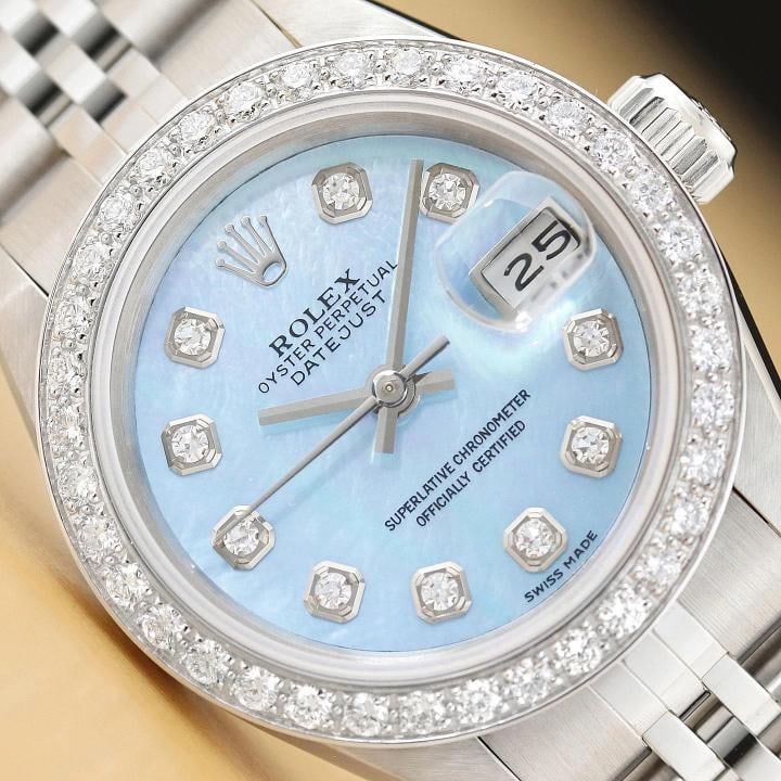 ROLEX LADIES DATEJUST 69174 ICE BLUE MOTHER OF PEARL 18K GOLD SS DIAMOND WATCH: Condition: Pre-owned - Excellent,Bezel Color: Silver,Max Wrist Size: 6.26-6.75 in,Number of Jewels: 29 Jewels,Indices: Diamond Markers,Band: Rolex Stainless Steel Jubilee Bracelet,Bezel: Custom 18K Wh