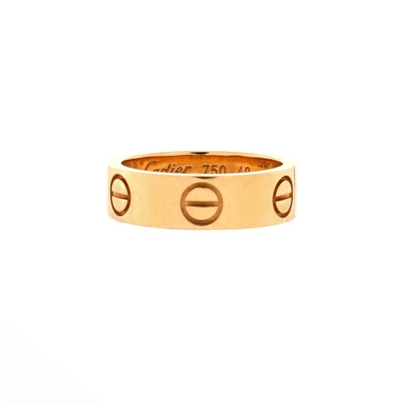 Cartier Love Band Ring 18K Yellow Gold: Condition: Pre-owned - Good,Brand: Cartier,Main Stone: Unknown,Metal: 18K Yellow Gold,Metal Purity: 18K,Ring Size: 4.75 - 49,Type: Ring,Color: Yellow Gold,Style: 18K Yellow Gold,Material: 18K Yellow