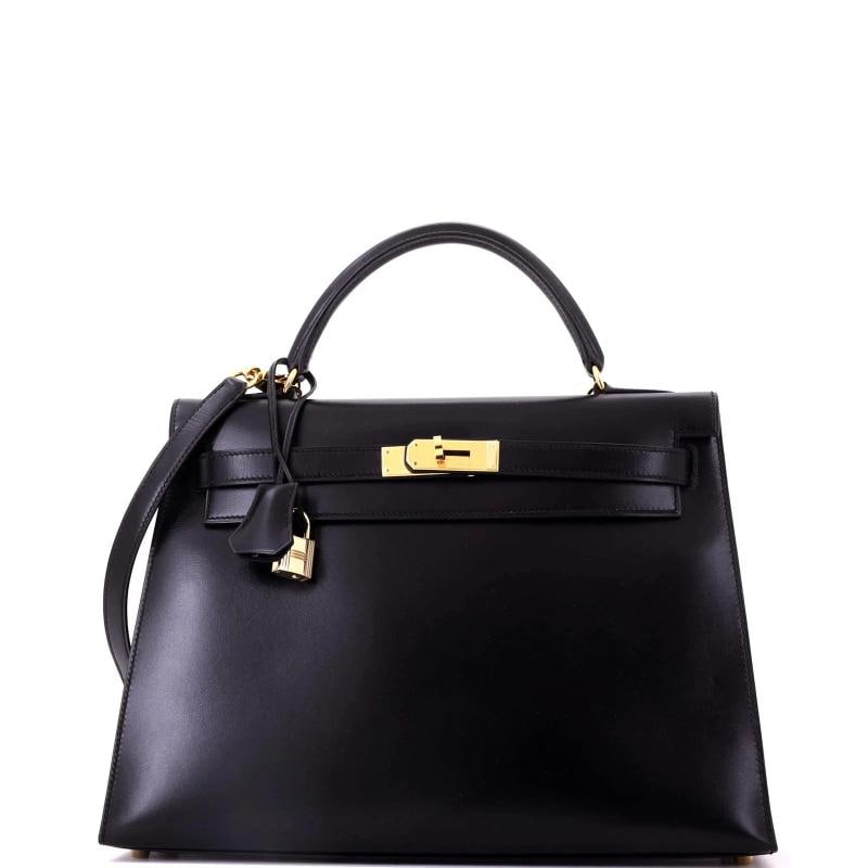 Hermes Kelly Handbag Black Box Calf with Gold Hardware 32: Condition: Pre-owned - Good,Brand: Hermes,Exterior Material: Leather,Style: Top Handle,Exterior Color: Black,Department: Women,Size: 32,Accessories: Lock, Clochette, Keys, With Strap Condition: Great.