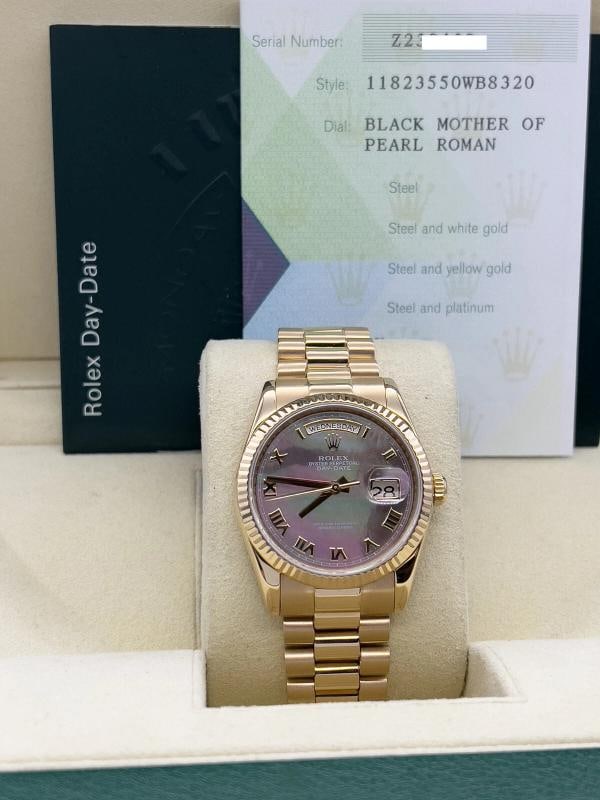 Rolex 118235 President Day Date Tahitian Mother Of Pearl 18K Rose Gold Box Paper: Condition: Pre-owned - Excellent,Country of Origin: Switzerland,Bezel Color: Pink,Dial Pattern: Mother of Pearl,Indices: Roman Numerals,Year Manufactured: 2000-2009,Band/Strap: Rolex President,Case