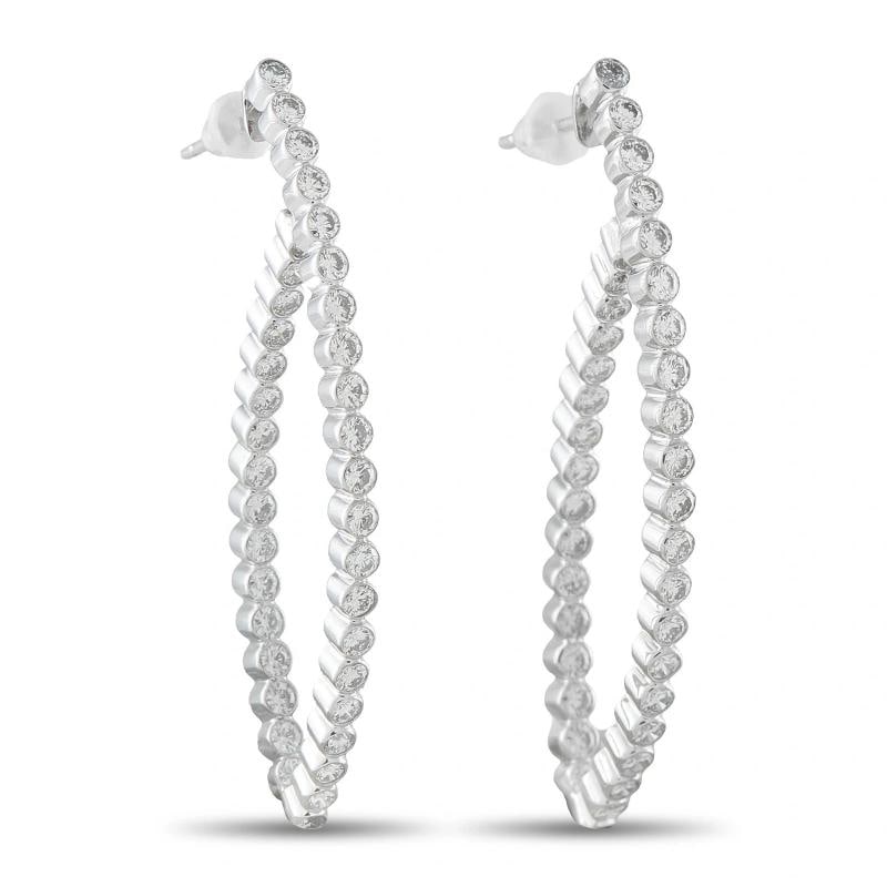 18K White Gold 2.20ct Diamond Hoop Earrings: Each earring measures approximately 1.88 by 0.63 inches, and the pair weighs 6.4 grams. . Condition: Pre-owned - Good: This item has been gently used but is in good condition. It might have a few