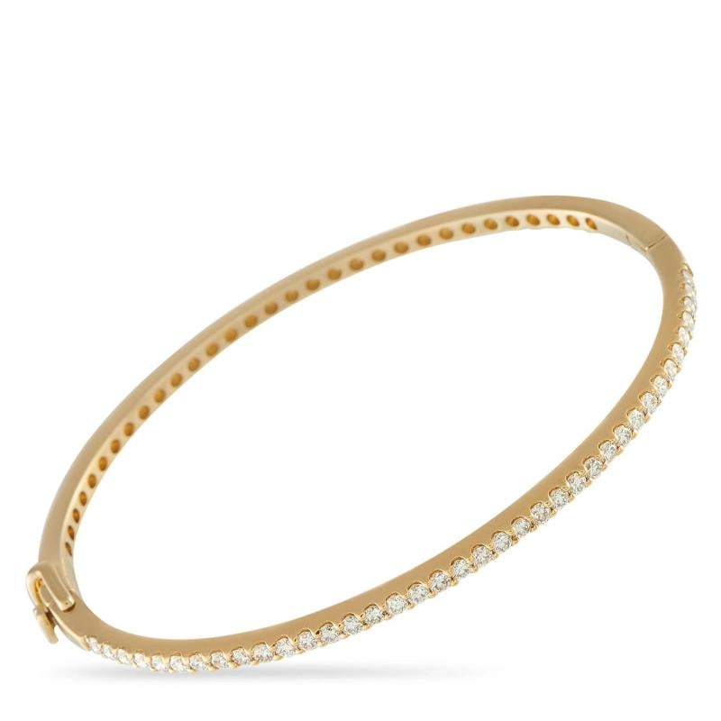 14K Yellow Gold 1.12ct Diamond Bangle Bracelet: Condition: Pre-owned - Good: This item has been gently used but is in good condition. It might have a few signs ... Read moreabout the conditionPre-owned - Good: This item has been gently used but is