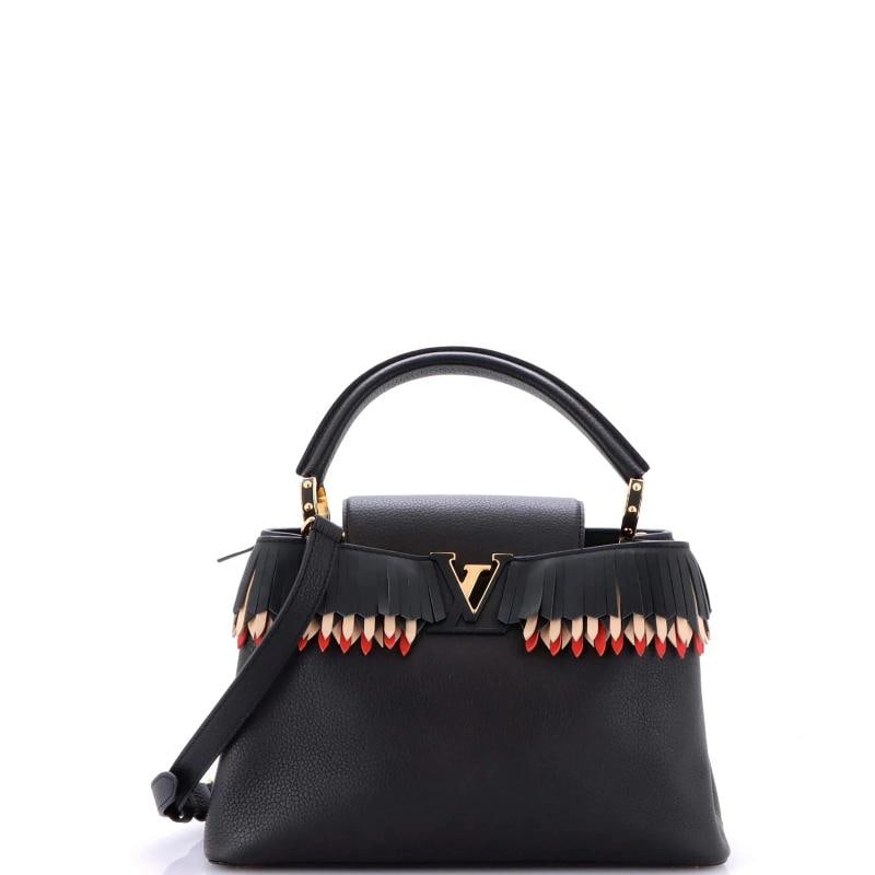 Louis Vuitton Capucines Bag Leather with Fringe Detail PM: Accessories: With Strap Measurements: Handle Drop 4.5", Height 8", Width 12", Depth 4", Strap Drop 21-23" . Condition: Pre-owned - Excellent,Brand: Louis Vuitton,Exterior Material: Leather,Style: Top
