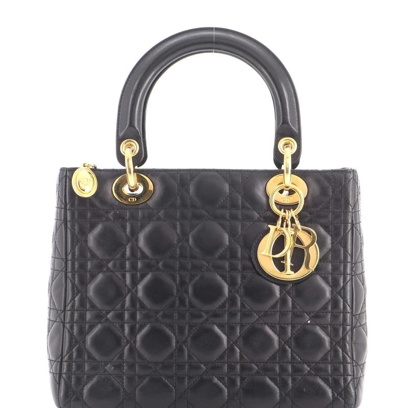 Christian Dior Lady Dior Bag Cannage Quilt Lambskin Medium: Measurements: Handle Drop 5", Height 8", Width 9.5", Depth 5", Strap Drop 17.5" . Condition: Pre-owned - Fair,Brand: Christian Dior,Exterior Material: Leather,Style: Top Handle,Exterior Color: Black,D