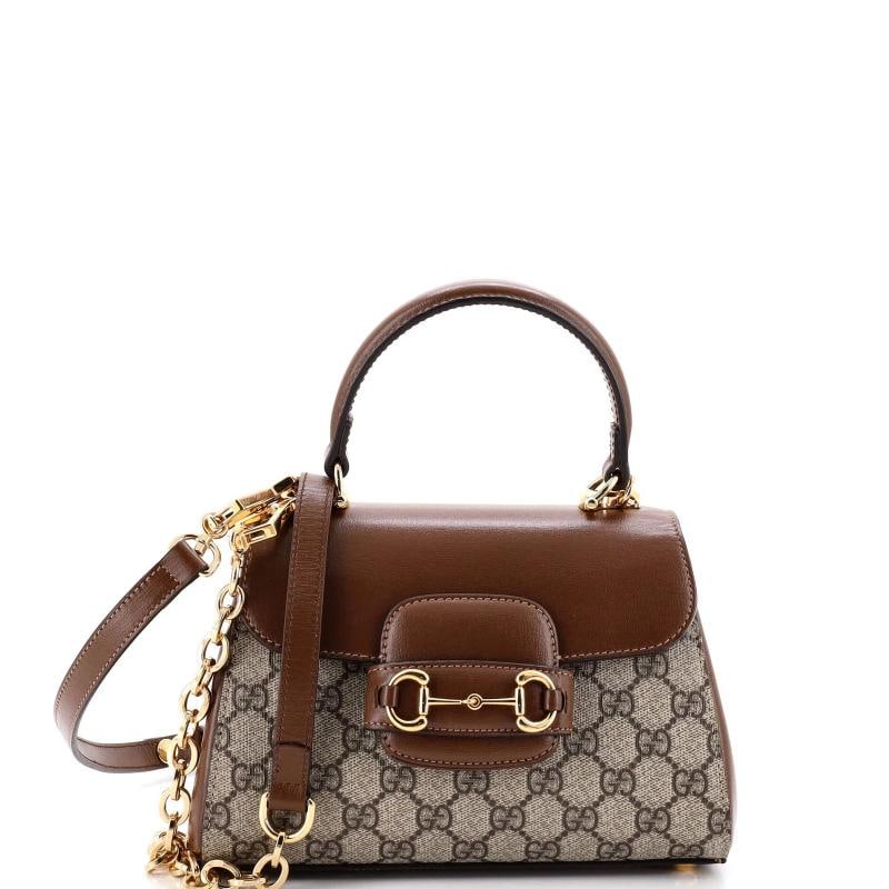 Gucci Horsebit 1955 Top Handle Flap Bag GG Coated Canvas and Leather Mini: Accessories: Dust Bag, Extra Strap, With Strap Measurements: Height 6", Width 8.5", Depth 5" . Condition: Pre-owned - Good,Brand: Gucci,Exterior Material: Canvas Coated, Leather,Style: Top