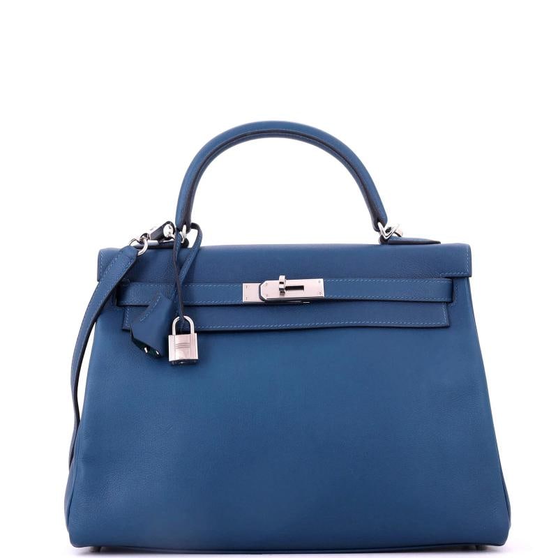 Hermes Kelly Handbag Verso Evercolor with Palladium Hardware 32: Accessories: Lock, Clochette, Keys, With Strap Measurements: Height 9", Width 12", Depth 4". Condition: Pre-owned - Good,Brand: Hermes,Exterior Material: Leather,Style: Top Handle,Exterior Color: