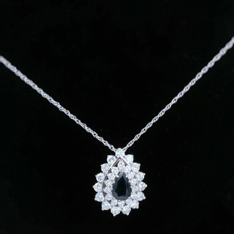 Sapphire & Diamond Pendant Necklace 14k White Gold: Condition: Pre-owned - Excellent,Pendant Shape: Teardrop,Main Stone Creation: Natural,Length (inches): 15",Color: White,Main Stone Color: Blue,Material: Gemstone,Metal: White Gold,Gender: