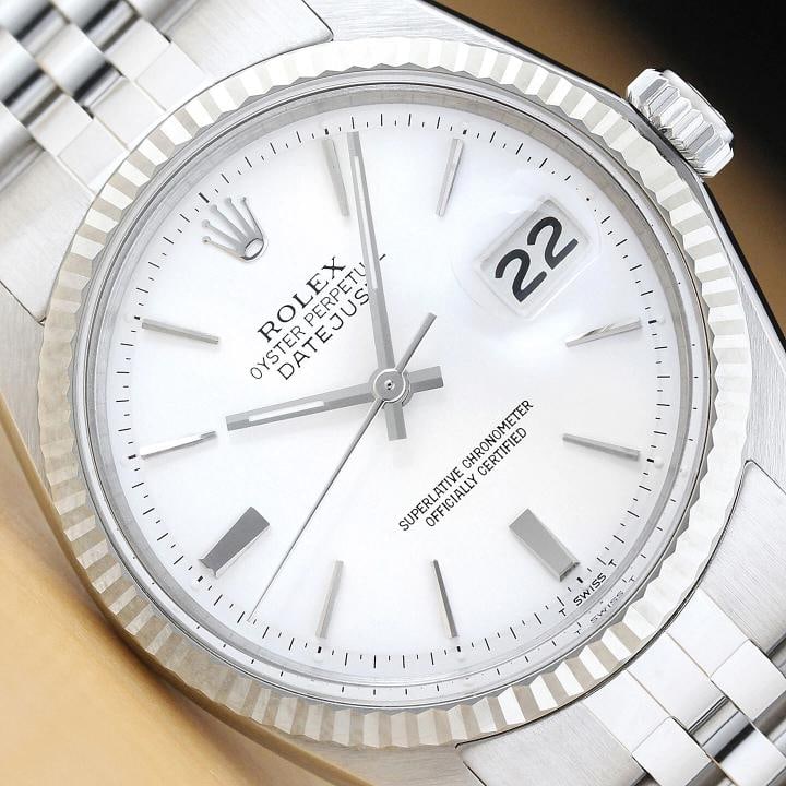 ROLEX MENS DATEJUST 1601 WHITE DIAL 18K GOLD STEEL WATCH w/ JUBILEE BRACELET: This is an authentic Rolex Datejust 1601 watch with Rolex 18K white gold fluted bezel, Rolex stick dial Ref., and custom stainless steel jubilee bracelet. Descriptions: Brand: Rolex Model: Datejust