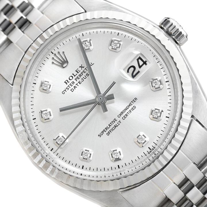 MENS ROLEX DATEJUST 1601 18K WHITE GOLD STAINLESS SS SILVER DIAMOND DIAL WATCH: This is an authentic Rolex Datejust 1601 watch with Rolex 18K white gold fluted bezel, custom stainless steel jubilee bracelet, and Rolex dial Ref. with added diamond markers.Descriptions: Brand: