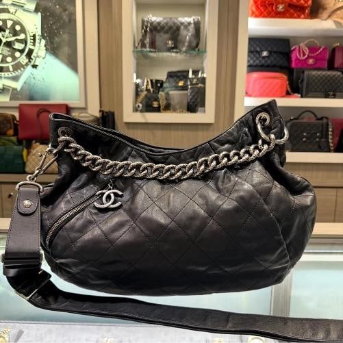 Chanel Distressed Calfskin Large Coco Pleats Hobo (2012): Condition: Pre-owned - Good,Brand: CHANEL,Department: Women,Size: Large,Exterior Color: Black,Style: Hobo Bag,Features: Chain Strap,Exterior Material: Leather,Country of Origin: Italy The Chanel