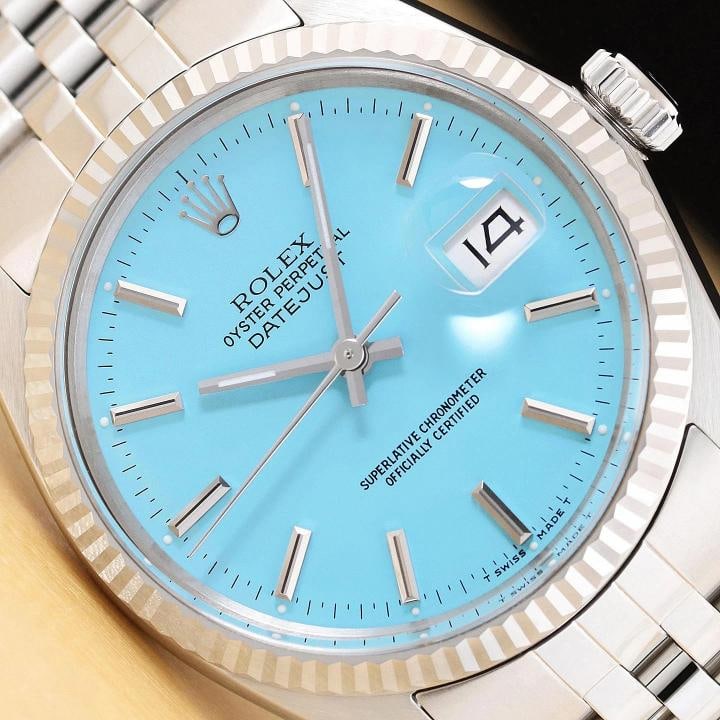 ROLEX MENS DATEJUST 16014 AQUA BLUE DIAL 18K WHITE GOLD STEEL JUBILEE WATCH: This is an authentic Rolex Datejust 16014 watch with Rolex stick dial Ref., Rolex 18K white gold fluted bezel, and Rolex stainless steel jubilee band. Descriptions: Brand: Rolex Model: Datejust