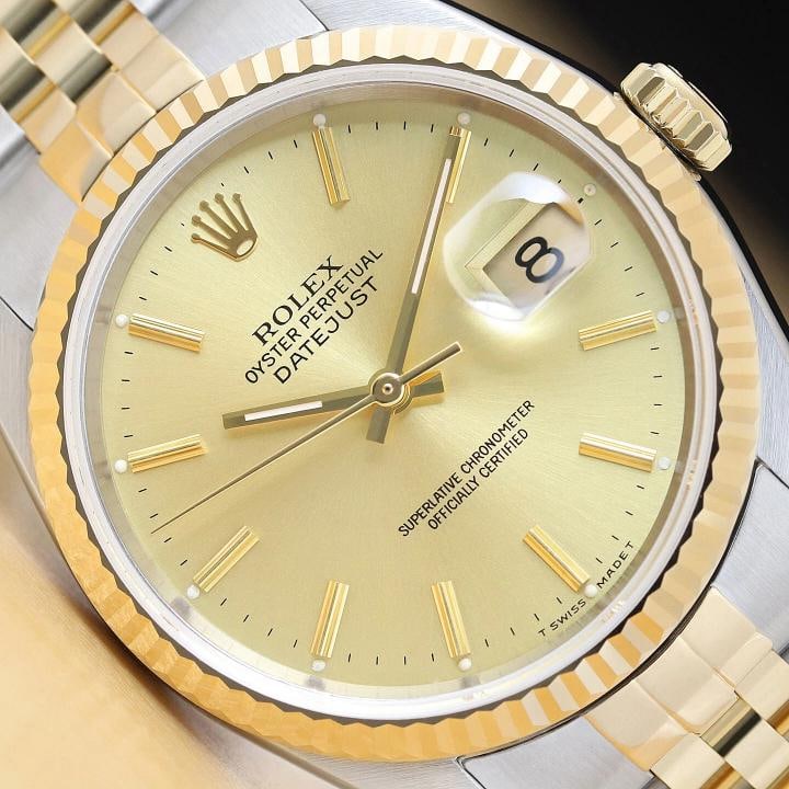 GENUINE ROLEX MENS DATEJUST 16233 CHAMPAGNE DIAL 18K YELLOW GOLD STEEL WATCH: This is an authentic Rolex Datejust 16233 watch with original Rolex 18K yellow gold and stainless steel jubilee bracelet, Rolex stick dial, and Rolex 18K yellow gold fluted bezel. Descriptions: