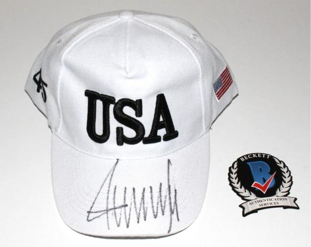 PRESIDENT DONALD J TRUMP SIGNED USA HAT (Beckett): President: Donald Trump,Signed: Yes,Autograph Authentication: Beckett,Country of Origin: United States